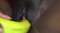 Black girl Tameka masturbating pussy with banana