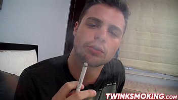 Horny stud Dustin Fitch likes taking a smoke while jerking