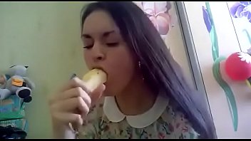 Young lady does the banana challenge and sends it to all her friends.