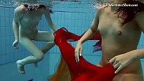 Two redheads swimming SUPER HOT!!!