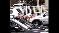 Couple caught fucking on the hood of the car in broad daylight