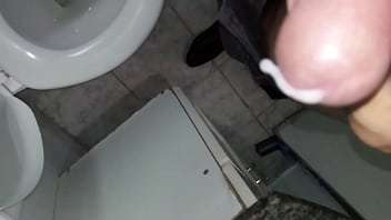 Hot handjob in the office bathroom with cum