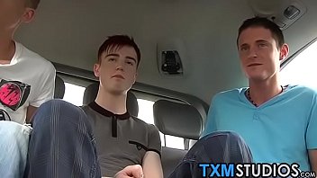 Three twink gays anally fuck and kiss in a moving car