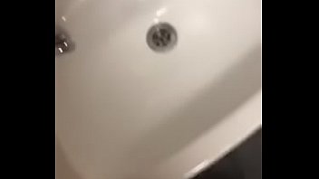 Big young cock shooting cumshot down the sink