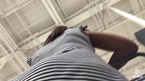 Under skirt of a nalgona in the supermarket with a little face