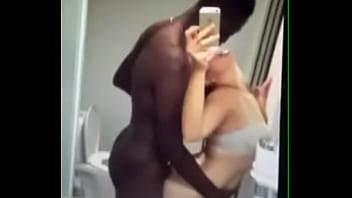 White woman records herself with a black dick