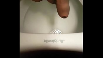 Me pissing at urinals