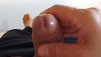 Close-up cum Spanish boy wanking in bed at the morning