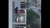 couple having sex on the porch