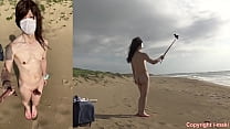 Crossdresser IJUIN Maki walking on the beach on windy day