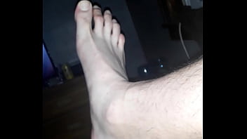 Boy show's big feet and soft cock
