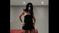A crossdresser Andressa do Brasil na sala sendo feminina e sexy