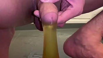 Pee on a condom and masturbate