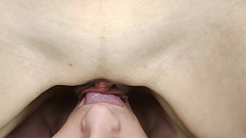 Wet pulsing vulva slides on man's tongue
