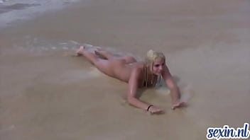 horny girls play on the nudist beach