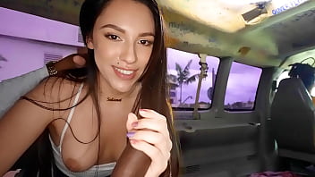 Beautiful amateur gives a blowjob in a van filmed by strangers