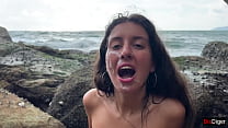 Wet girl fucks and gets huge cum on face on public exotic beach