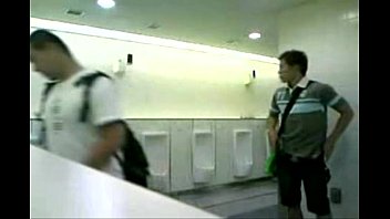 Guy beats-off in public mens room