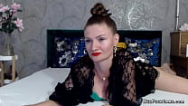 Busty Romanian MILF oiling tits closeup on webcam show